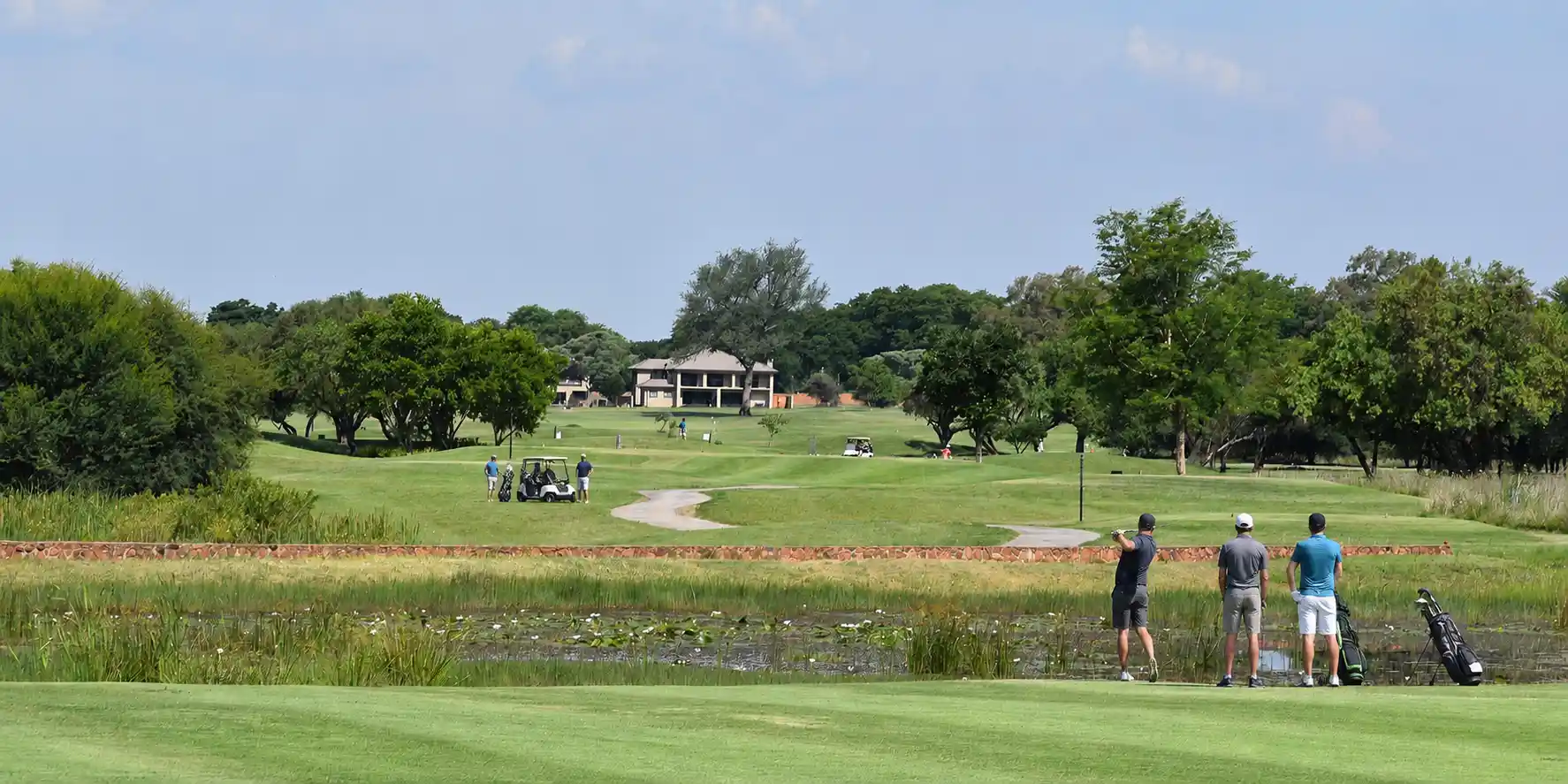 Group of friends enjoying a golf weekend getaway at Bokmakierie Place in Modimolle